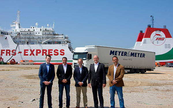 FRS and Meyer & Meyer representatives in front of the Al Alandus Express.