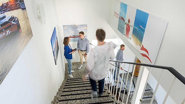 Collegues meeting at FRS headquarters' hallway