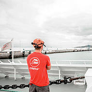 Crew member FRS Iberia from behind.